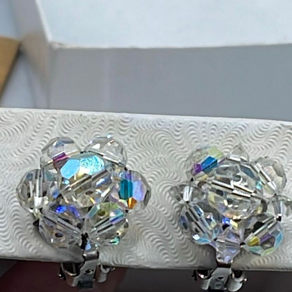 Midcentury Aura Borealis beaded floral clip earrings.
